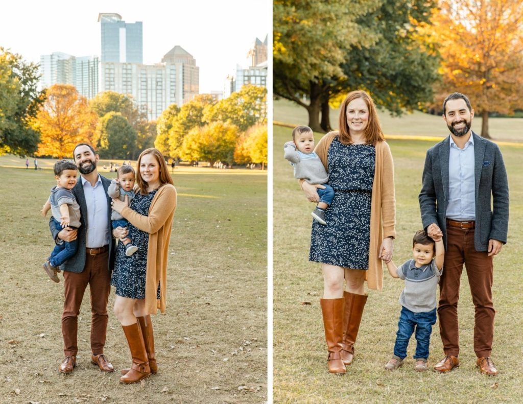 Parents with toddler and baby standing in front of Atlanta skyline by Laure Photography
