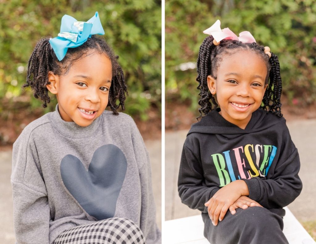 cousins toddlers sitting and posing during a mini session in an Atlanta park with Laure Photography