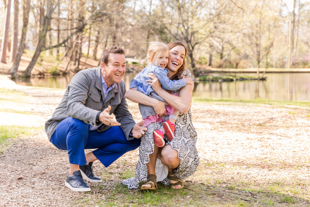 lifestyle photo during family session in a Buckhead Atlanta park with Laure Photography