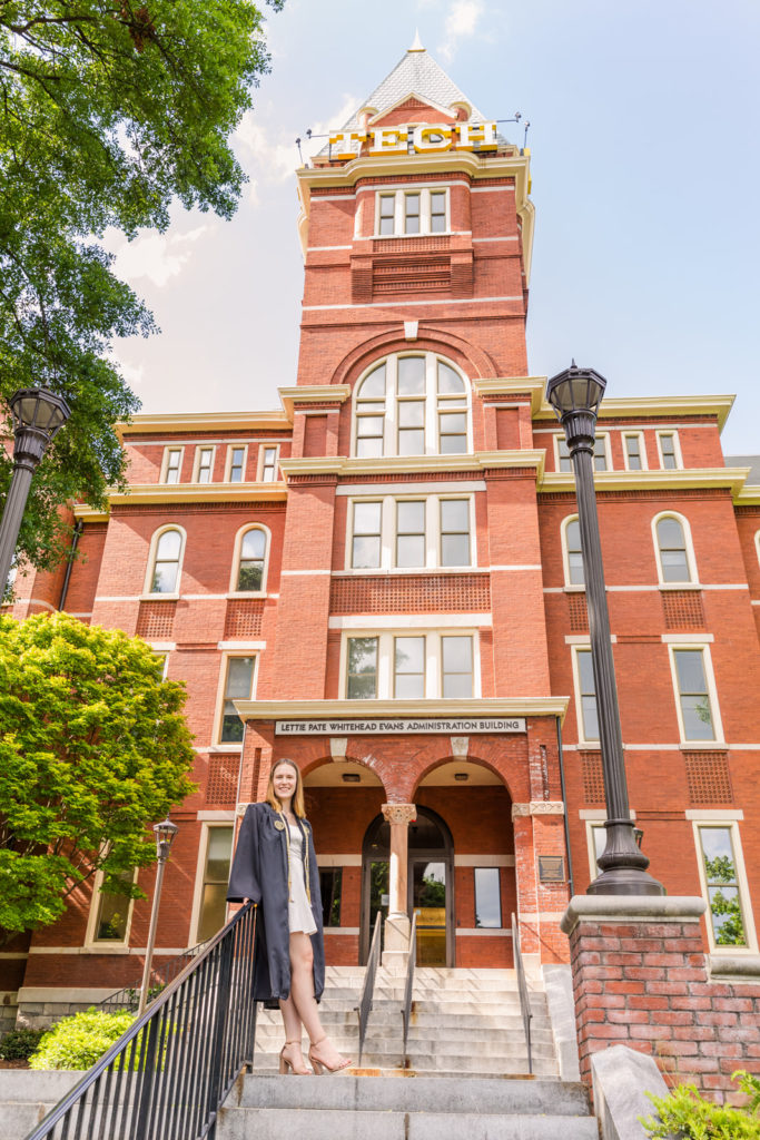 Georgia Tech college graduation graduate in front of historic campus towner by Atlanta Photographer Laure Photography