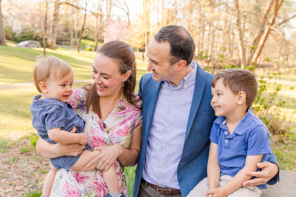 lifestyle family picture during portrait session in Atlanta Buckhead Duck Pond park with Laure Photography