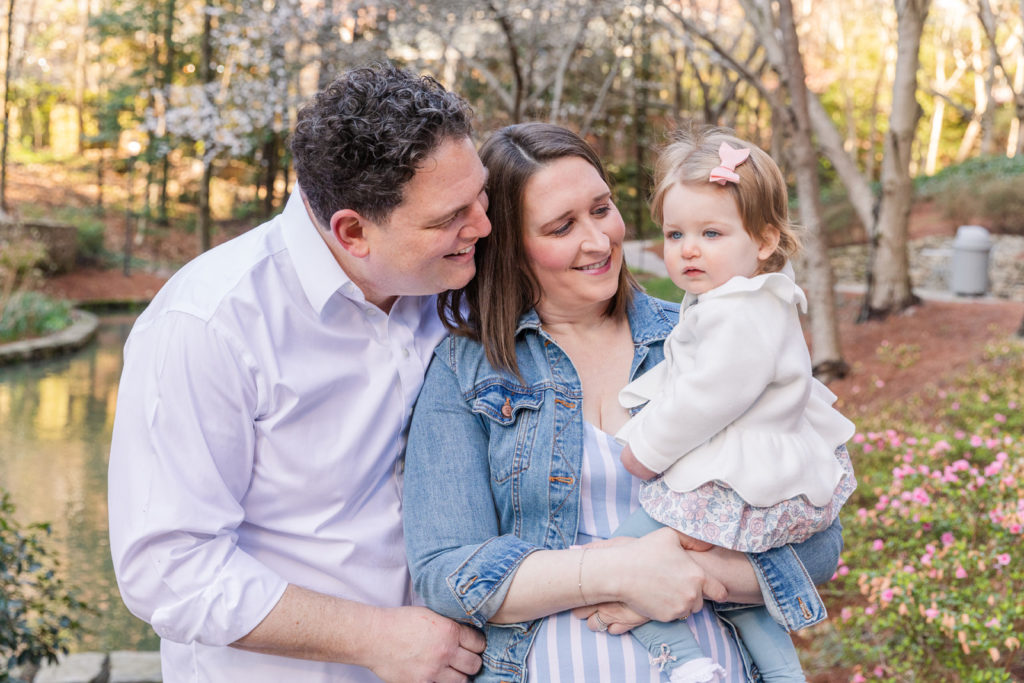 parents and baby during milestone portraits in Dunwoody with Atlanta family photographer Laure Photography