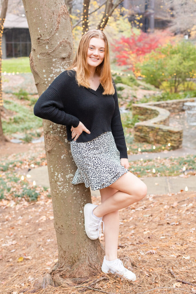 Girl teenager Atlanta high school senior leaning against a tree photo session by Laure Photography