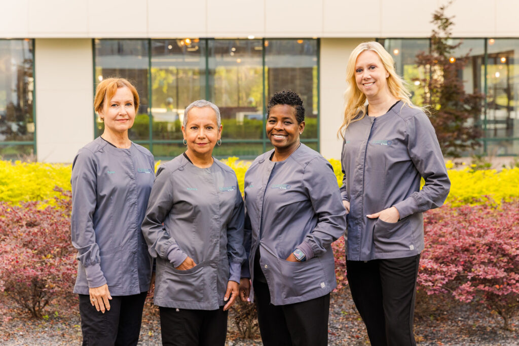 Professional photo of assistants team from Atlanta dentist office Charles Arp, DDS & Associates by brand photographer Laure photography