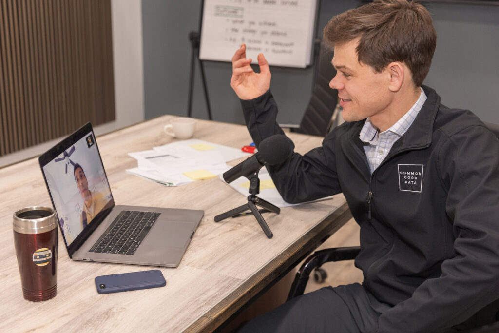 Consultant having a Zoom meeting in modern conference room during Atlanta brand photo session