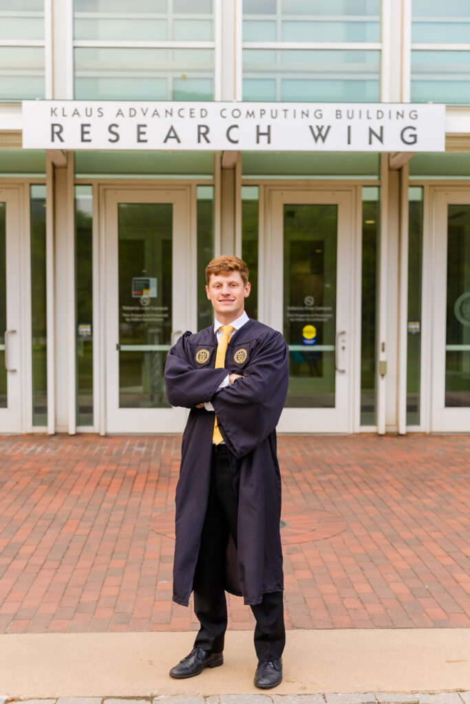 Jason standing in front of the research wing of the Georgia Tech computing building.