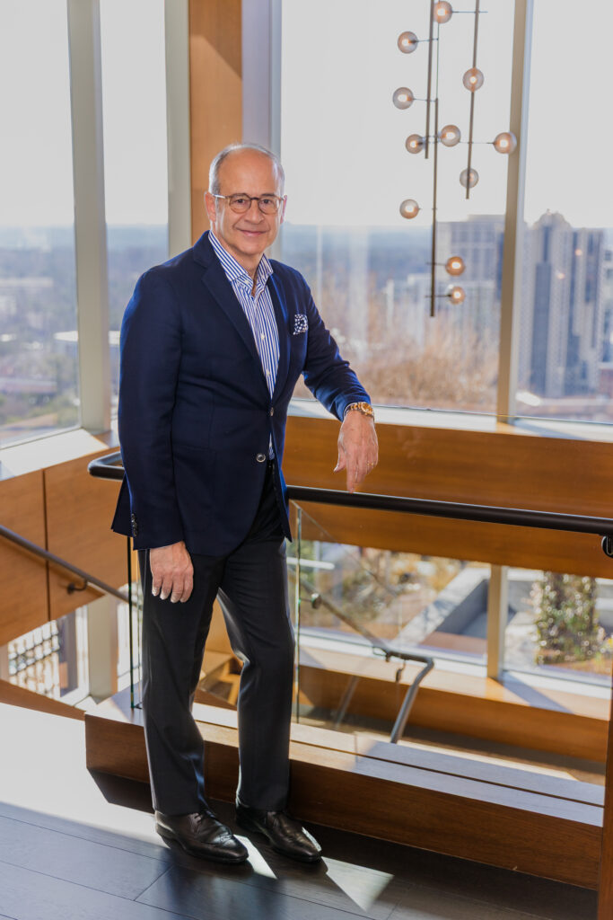 Ahmet Bozer Standing on Stairs at Modern Atlanta Office | Laure Photography