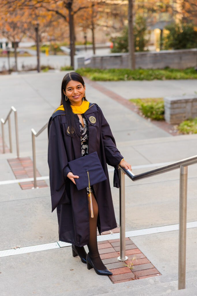 Graduation photo of Pallovi standing on outdoor Georgia Tech stairs photographed from above