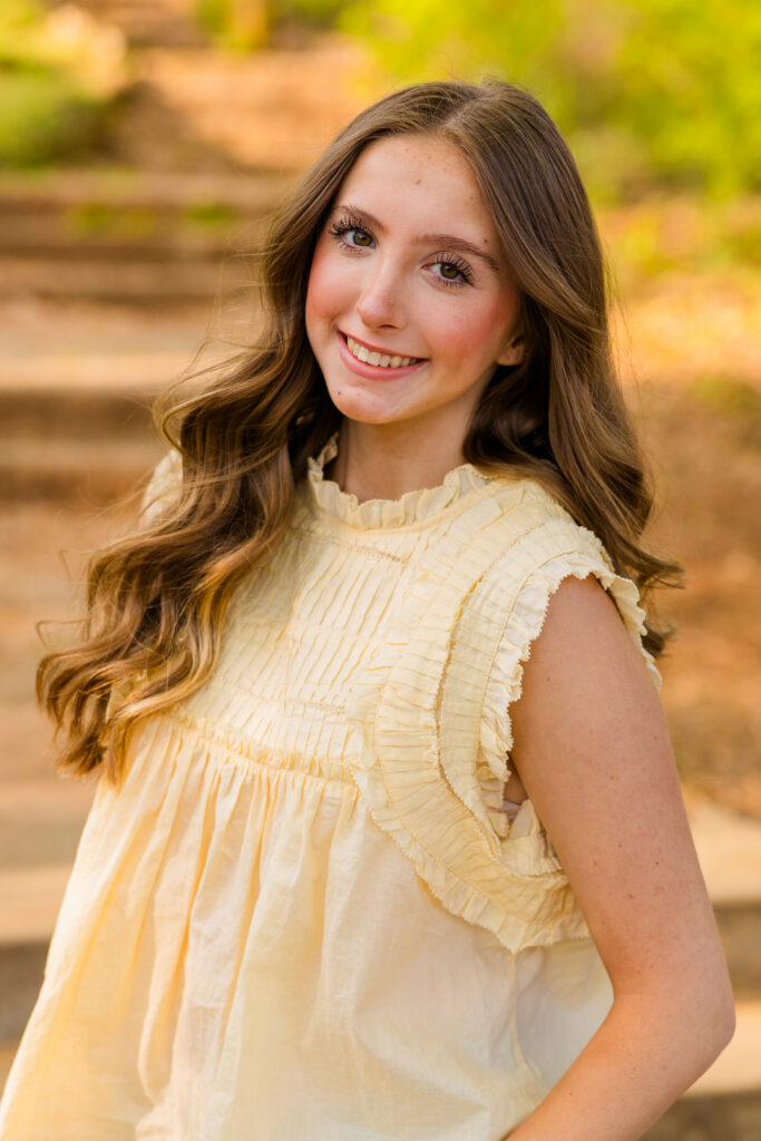 Close-up senior portrait with natural light in Piedmont Park Atlanta