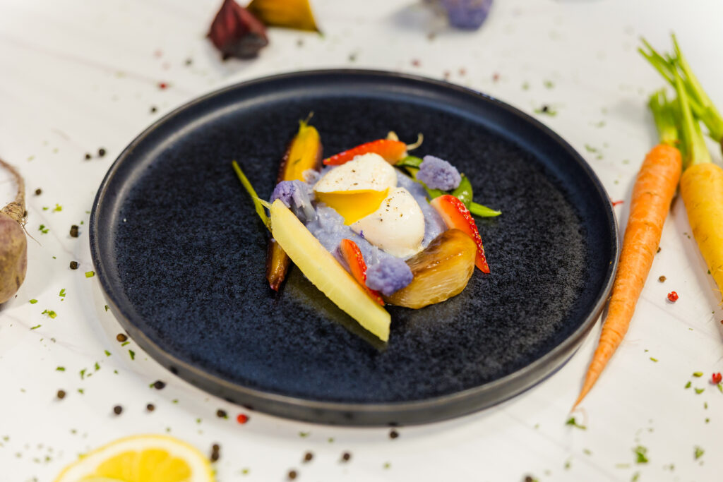 Close-up side view of vegetarian plate with styled ingredients