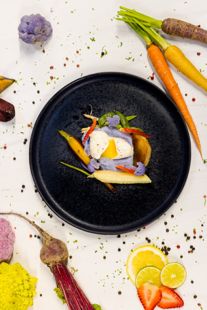 Overhead close-up of vegetarian dish with colorful elements