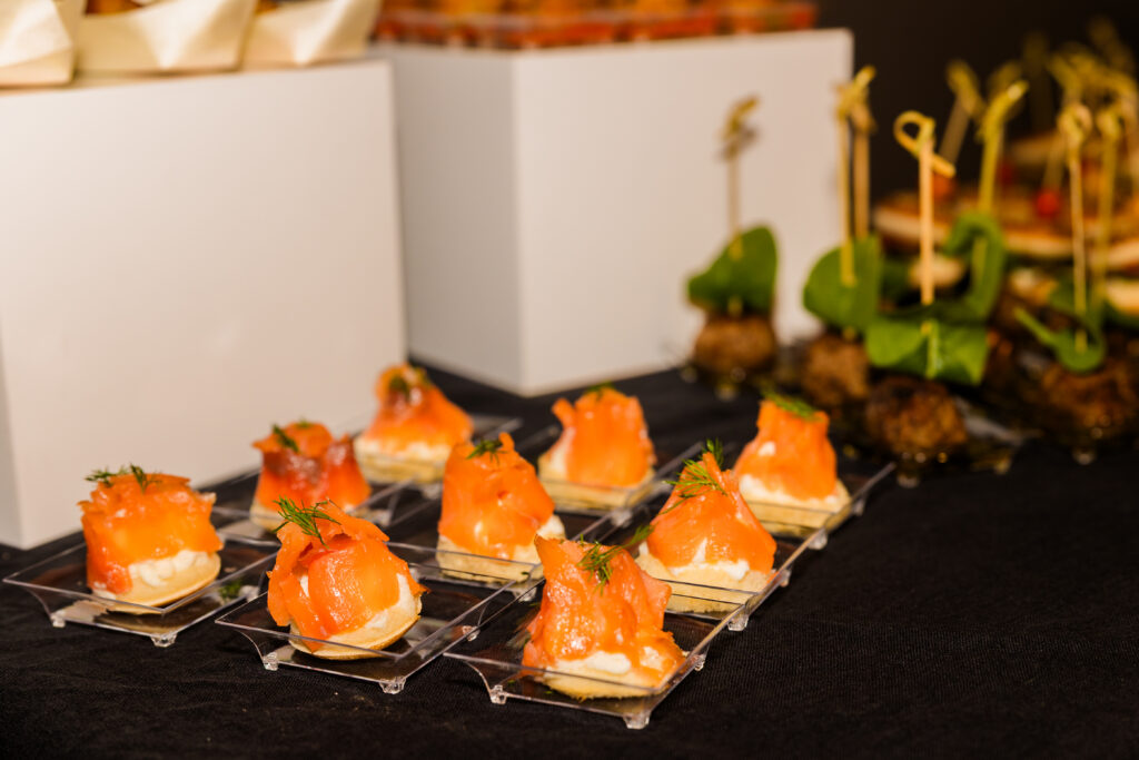 Close-up of salmon bites on corporate buffet