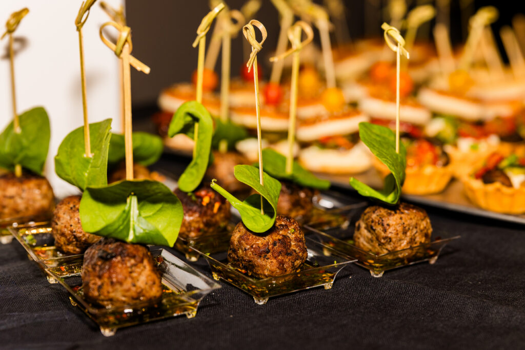 Individual meatball portions served at corporate event