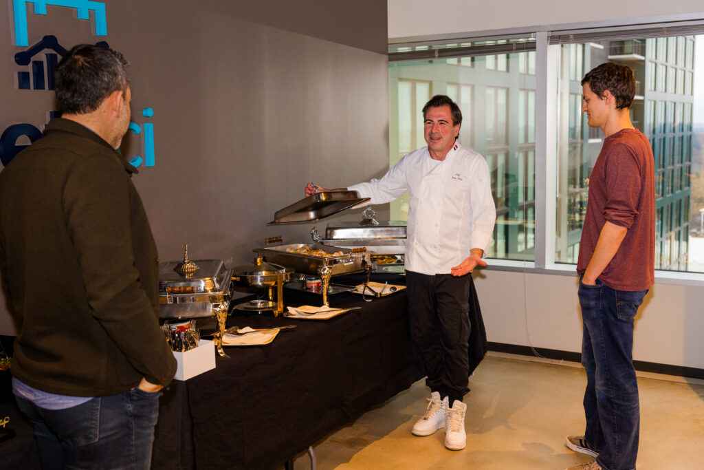 Chef presenting catering options to clients